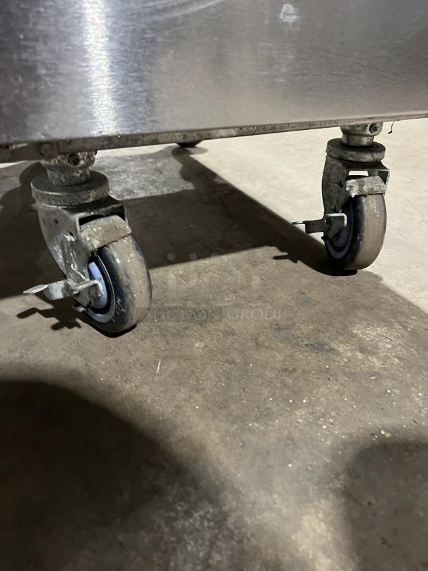 Vulcan PowerFry3 fryer on casters, showing sturdy wheels. Model 1TR45D-1, stainless steel, with visible wear.