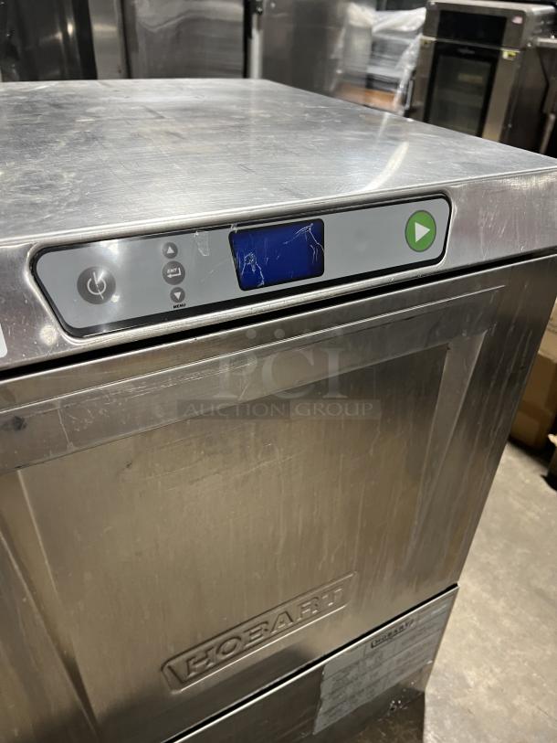 Hobart LXe stainless steel undercounter dishwasher, new body style, with control panel and dish rack, model LXe.