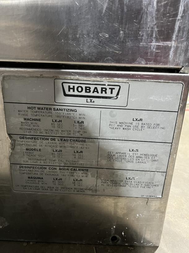 Hobart LXe commercial dishwasher, stainless steel, electric, undercounter model, new body style, with dish rack, Model LXe.