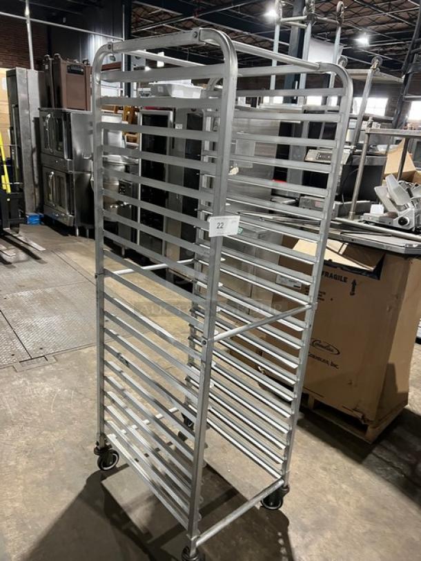 Commercial aluminum 20-pan sheet/bun pan rack on casters. Heavy-duty, industrial condition, numbered tag visible.