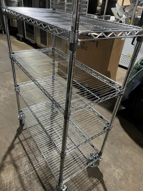 Metro Super Erecta Series chrome storage rack with multiple tiers on casters, excellent condition, ideal for commercial use.