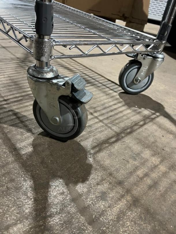 Metro Super Erecta Series chrome-plated utility rack on casters, featuring multi-tier wire shelves.