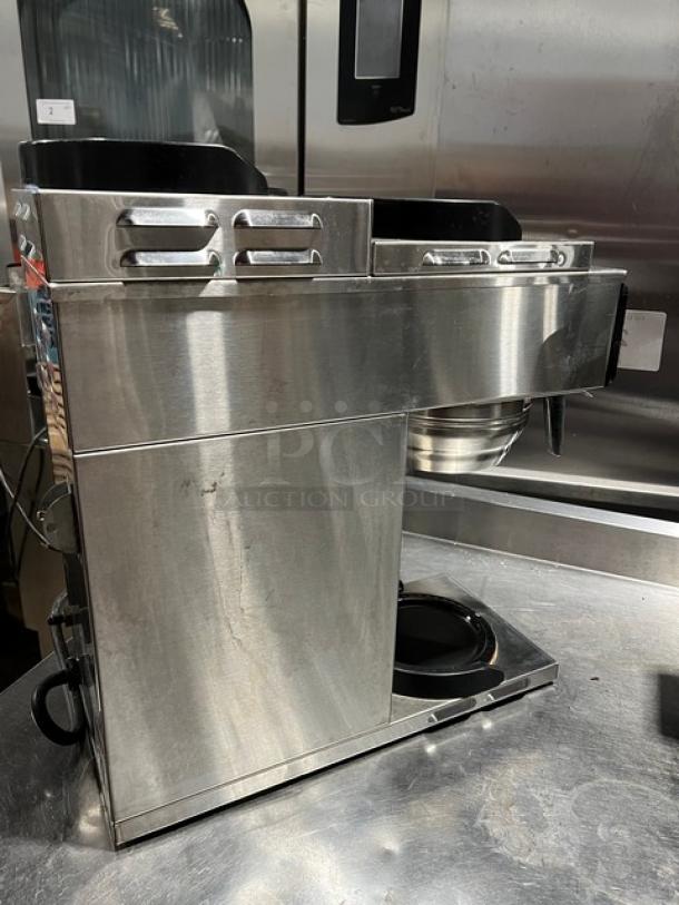 Bunn AXIOM-3 commercial coffee brewer, stainless steel, 3 warming plates, heavy-duty brew basket, used condition.