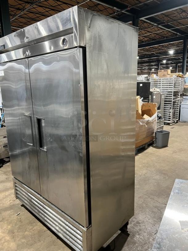 True T-49 commercial stainless steel 2-door refrigerator on casters. Energy Star certified, poly-coated wire rack, used condition.