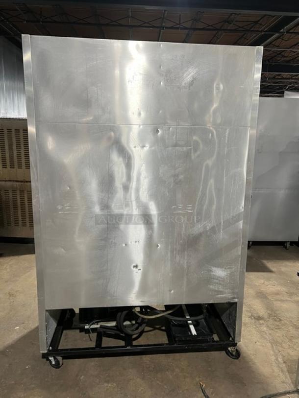 True T-49 commercial stainless steel 2-door reach-in refrigerator, Energy Star certified, poly coated wire rack, on casters.