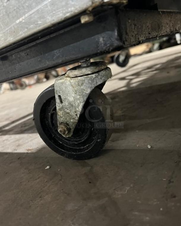 True T-49 commercial fridge caster wheel, sturdy and functional; supports stainless steel 2-door reach-in refrigerator.