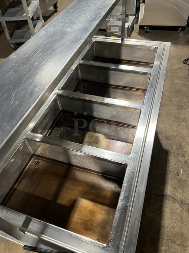 Atlas Metal 4-well stainless steel steamtable with sneeze guard, tray slide, enclosed cabinet; Model WIHDM4, on casters.