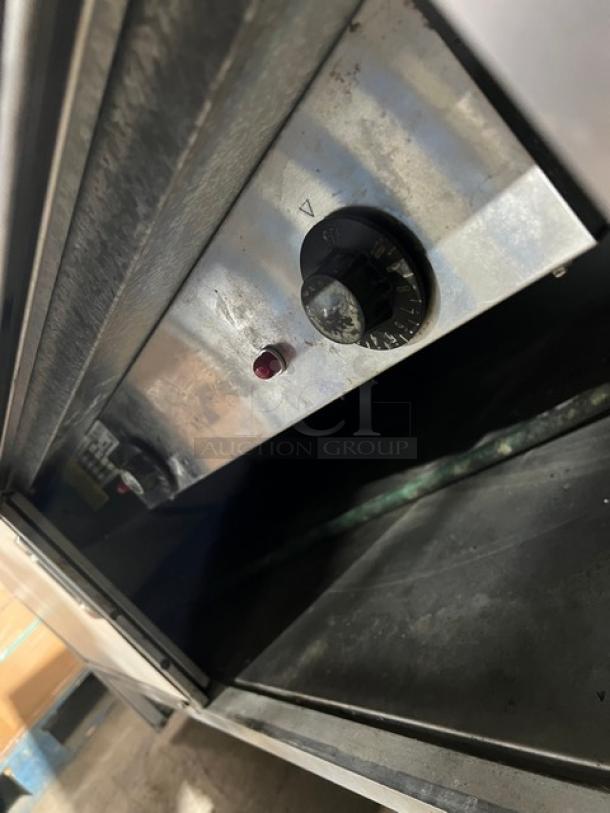 Atlas Metal WIHDM4 stainless steel steamtable, 4-well, electric, serve over sneeze guard, tray slide, enclosed storage, on casters.