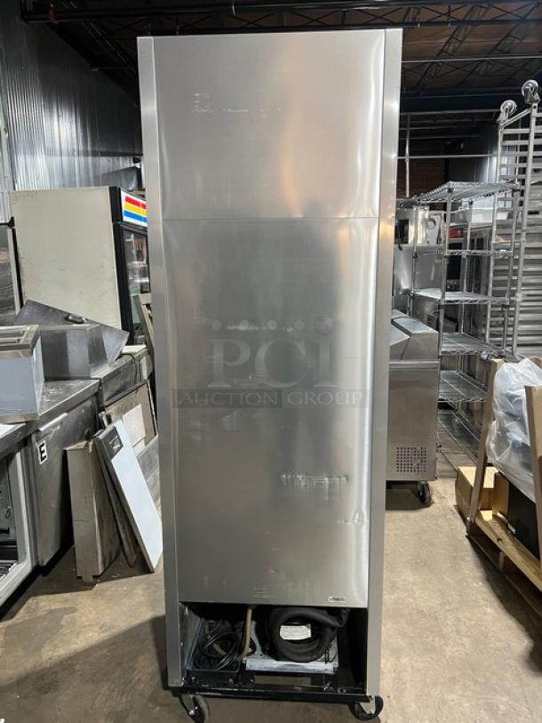 True T-23 stainless steel single door reach-in refrigerator, with poly coated wired rack, 115V 1 phase, on casters, Serial No. 1-3522772.