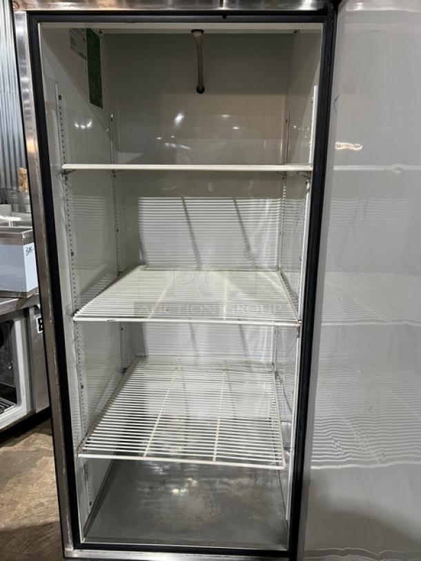 True T-23 single door stainless steel refrigerator, poly coated racks, on casters, 115V 1 Phase. Model: T-23 SN: 1-3522772.