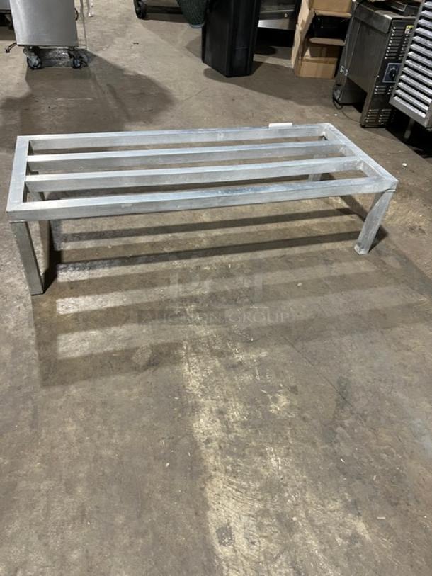 Commercial heavy-duty aluminum dunnage rack with legs. Durable construction, ideal for storage. Great condition.