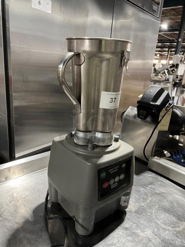 Waring CB15 commercial blender with 1-gal stainless steel container, model CB15, serial 564246, on legs, 120V.