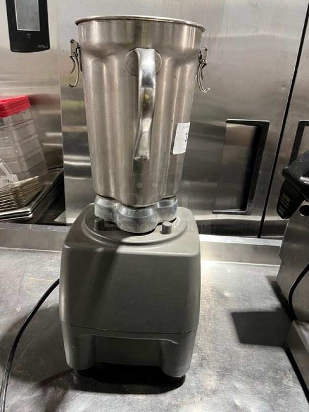Waring CB15 commercial blender with 1-gal stainless steel container, 120V, heavy-duty construction on legs. Model SN: 564246.