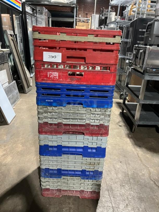 Commercial dish/cup rack stack with extenders, assorted glassware included. Colors: red, blue, gray. Tag indicates "38x7".