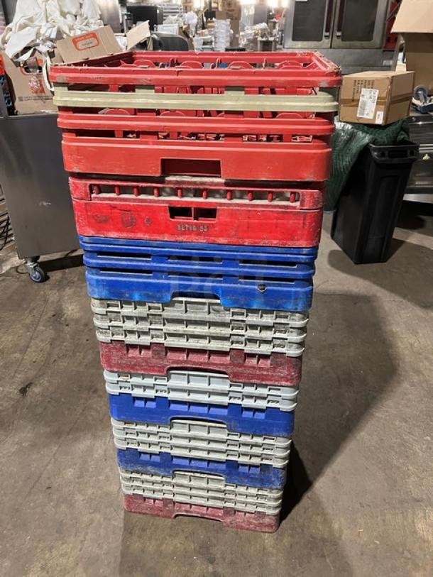 Commercial dish/cup rack and extenders with assorted glass, stacked. Includes red and blue racks. Condition: used.