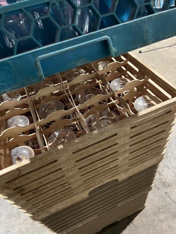 Commercial dish/cup rack with extenders, containing assorted glassware. Durable construction, good condition. Ideal for restaurant use.
