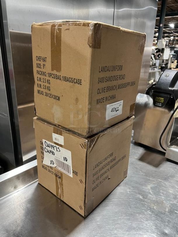 New Landau Uniforms white 9" round chef hats in original boxes. Includes two boxes, 10 pieces per box. Made in China.