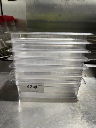 Carlisle commercial clear polycarbonate 1/3-size food pan, model 30661, 4" deep, showing stack of 7 with label "42 QTY".