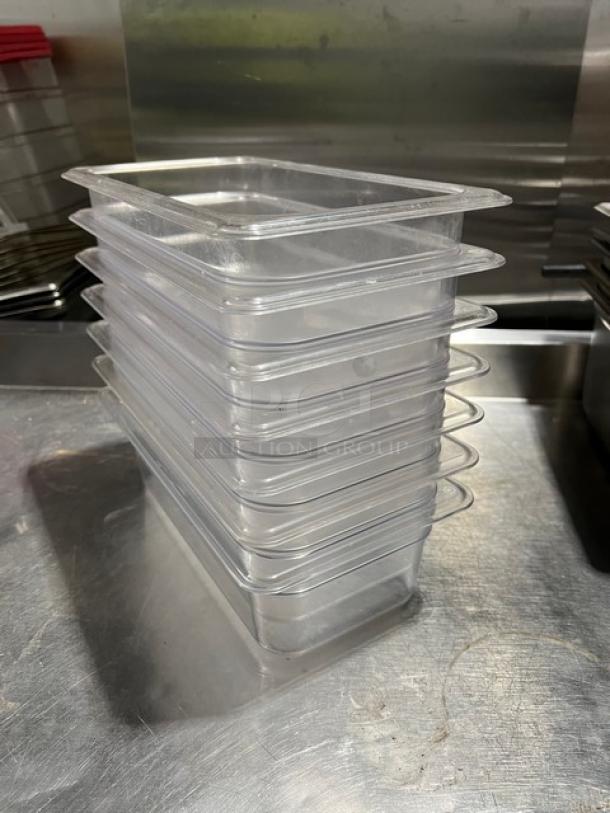 Carlisle 30661 clear polycarbonate 1/3-size 4" deep food pans, stack of 7, durable, commercial use.