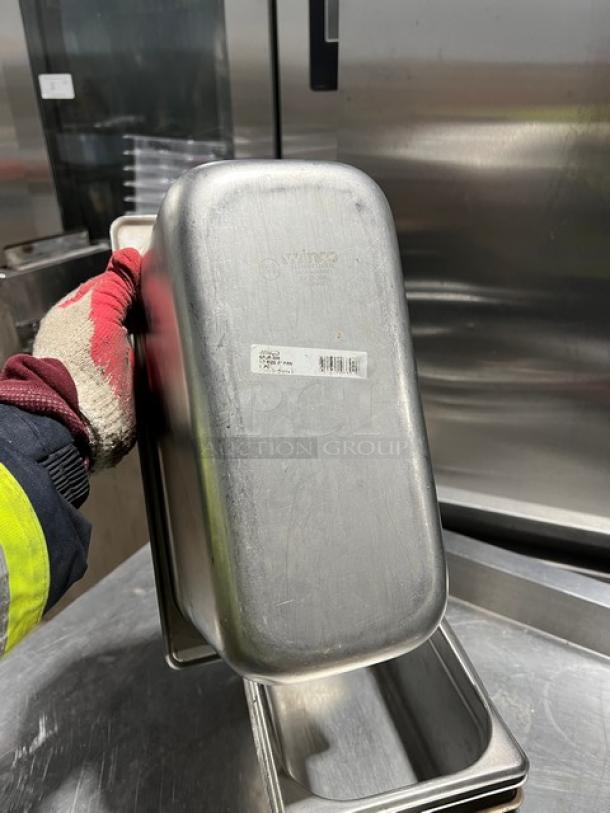 Winco SPJP-306 stainless steel 1/3-size 6" deep steamtable pan, lightly used, embossed with brand logo, visible label.
