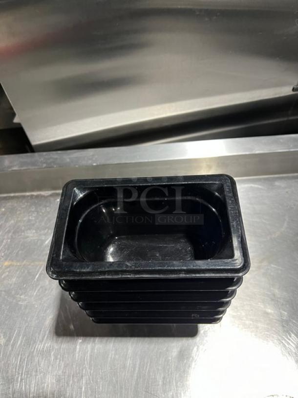 Vollrath Super Pan 3 Series 1/9-Size, 4" deep black food pan, Model 90944, stackable, commercial-grade, excellent condition.