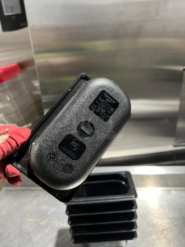 Vollrath Super Pan 3, Model 90944, black 1/9-size, 4" deep food pan, commercial-grade, new condition, visible brand markings.