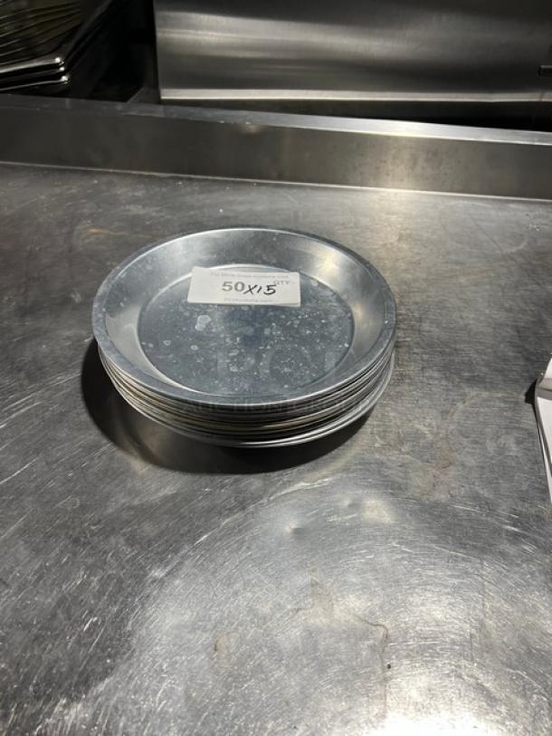 Commercial aluminum round pie pan stack, 15 shown; marked "50X/5", indicating bulk purchase or size, good condition.