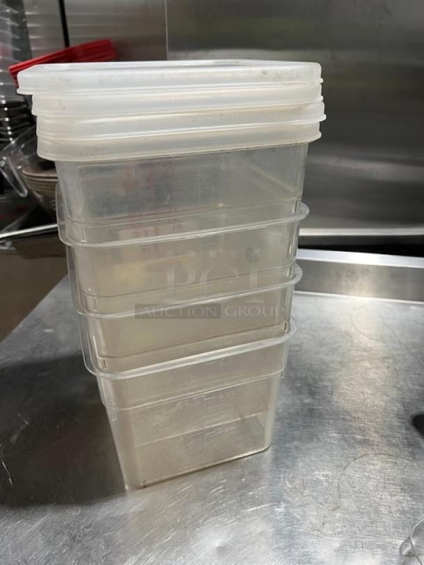 Cambro Commercial 6 Qt. Clear Polycarbonate Square Food Storage Container with Lid shown stacked, in good condition.