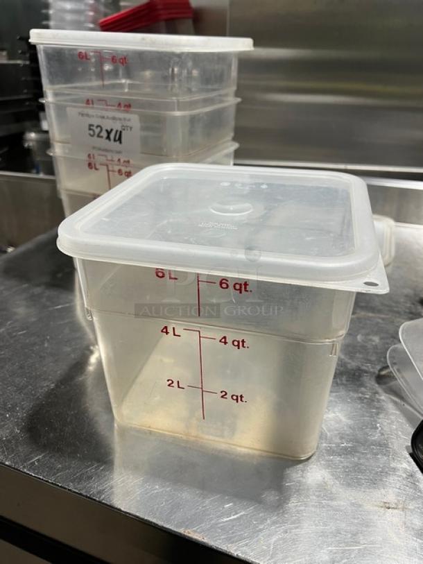 Cambro 6 Qt. clear polycarbonate square food storage container with lid; features red measurement markings.