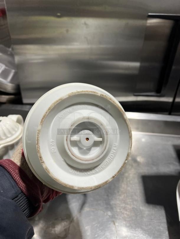 White swirl-design 42 oz. thermal coffee carafe, commercial-grade, visible bottom marks indicate it's made by Alfi, Germany.