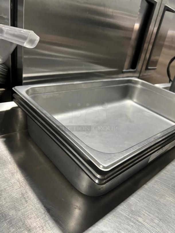 Winco commercial stainless steel full-size 4" deep anti-jam steamtable pan, model SPJL-104, in excellent condition.