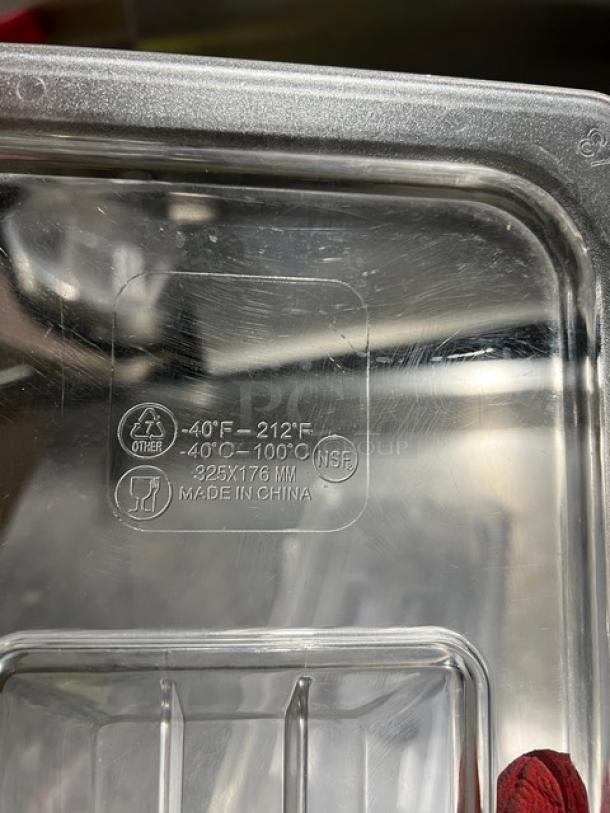 Clear polycarbonate food pan lid with notch and handle, 325x176 mm, temperature range -40°F to 212°F, NSF certified, made in China.