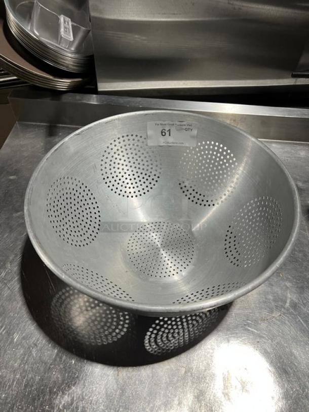 Commercial aluminum colander with round geometric pattern, excellent condition. Label with number 61 indicates lot.
