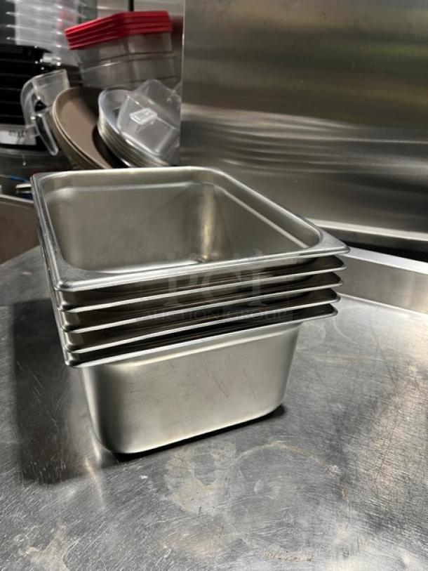Winco SPJP-206 stainless steel 1/2-size, 6" deep anti-jam pan stack, ideal for commercial kitchens. New condition.