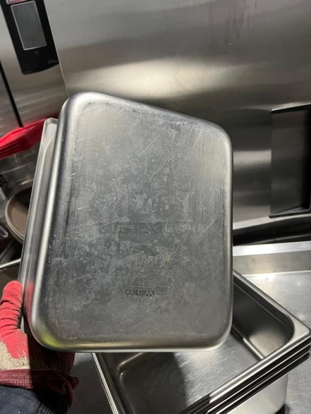 Winco SPJP-206 stainless steel 1/2-size, 6" deep anti-jam steamtable pan in used condition; engraving visible.