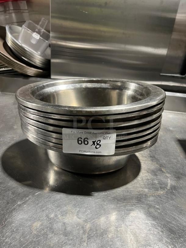 Commercial stainless steel oval food pan, stack of 8, in good condition. Label states "66 x8 QTY."
