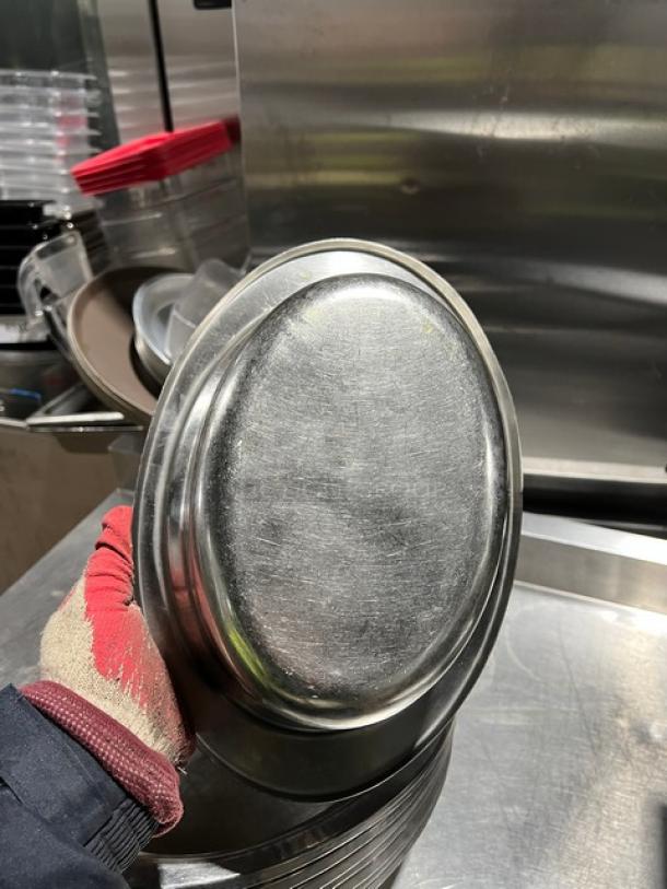 Stainless steel oval food pan, commercial grade, good condition, reflective surface, stackable design, 8 pans available.