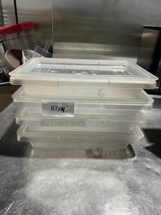 Carlisle StorPlus 2-Gal clear polycarbonate food storage containers with lids, stacked; labels indicate model and auction details.