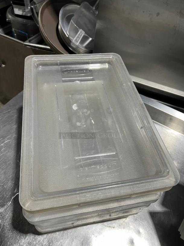 Carlisle StorPlus 2-Gal clear polycarbonate food storage container with lid, showing stackable design and durable construction.