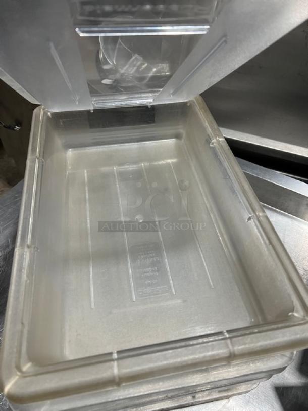 Clear Carlisle StorPlus 2-gal polycarbonate food storage container with lid; durable, ideal for commercial use.