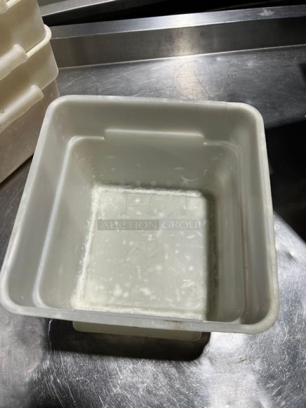 Cambro commercial square food storage container, white, with navy-blue lid. Used condition, sturdy plastic material. No labels visible.