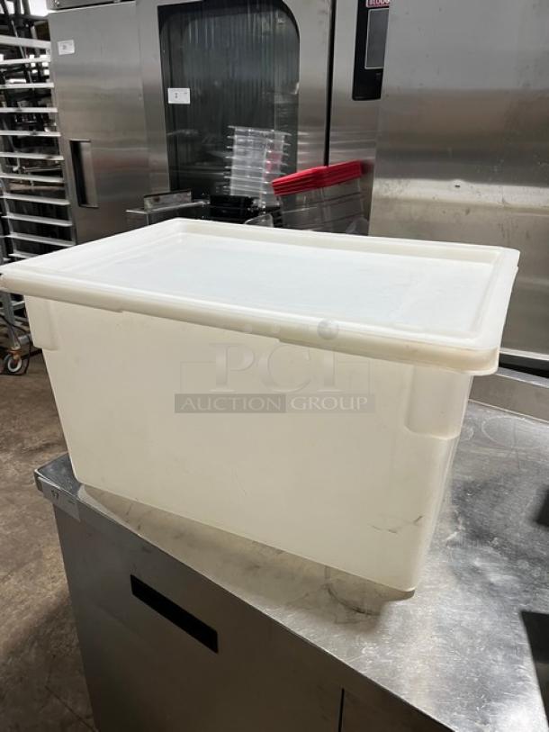 Commercial rectangular food storage container with lid, white, durable plastic, lightly used, suitable for bulk storage.
