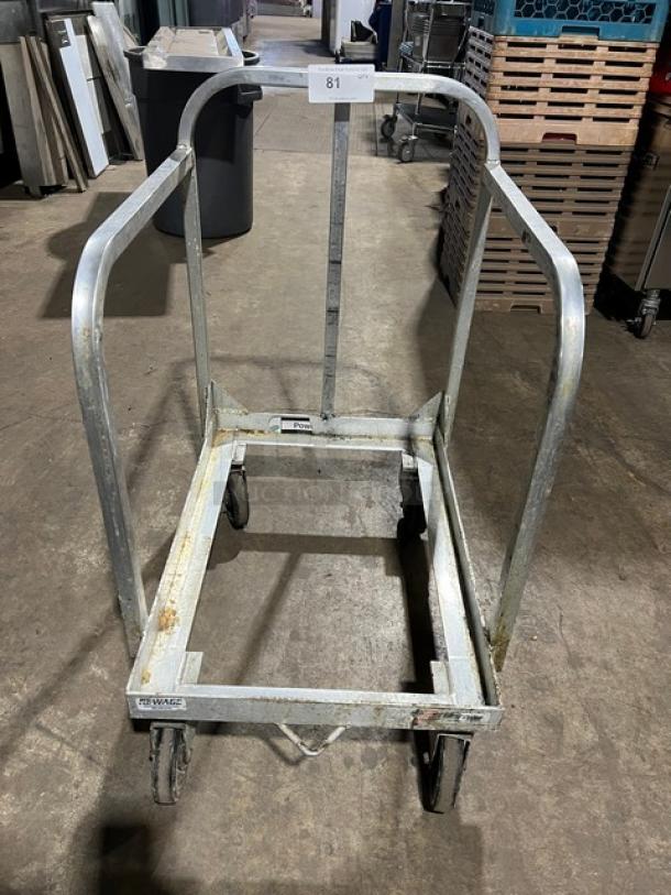 New Age Industries heavy-duty sheet pan dolly, commercial-grade, on casters, metal frame, used condition.