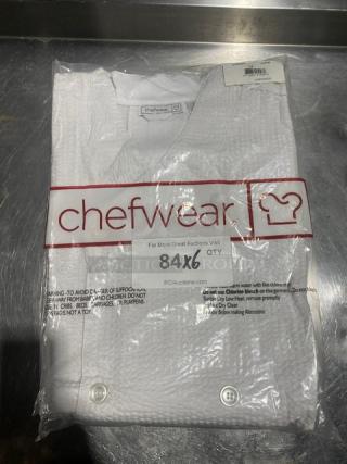 New Chefwear commercial chef coat, white, size 3X, model CW5031-CW40, textured style, in original packaging.
