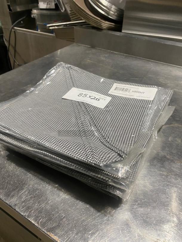 San Jamar H500HT neckerchiefs, black and white poly/cotton blend, in new condition, in sealed packaging, labeled 85x26 inches.