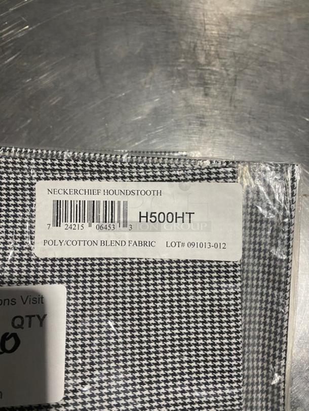 San Jamar H500HT neckerchief, black & white houndstooth, poly/cotton blend, new condition. Tags show model and lot number.