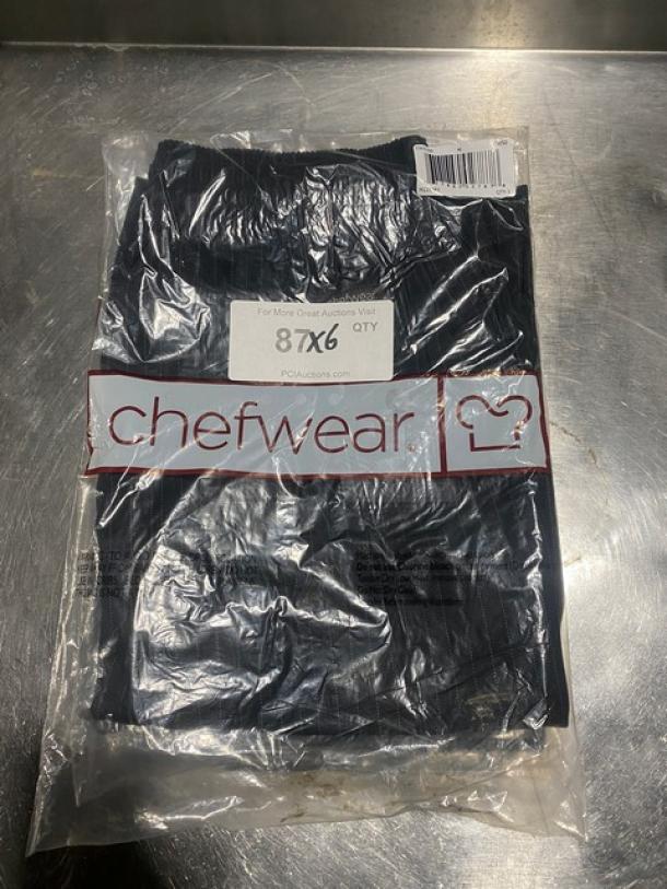 New Chefwear commercial black chef pants, medium size, model CW3100-CW50, sealed in packaging.