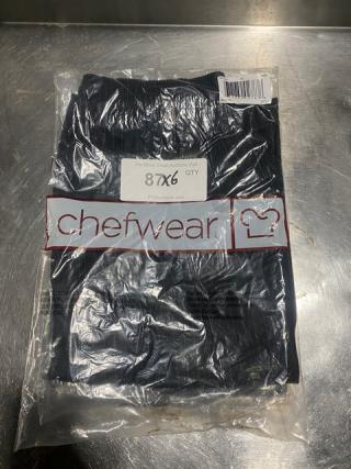 New Chefwear commercial black chef pants, medium size, model CW3100-CW50, sealed in packaging.