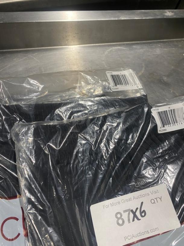 New Chefwear commercial black chef pants, size medium, model CW3100-CW50, in original packaging with tags.