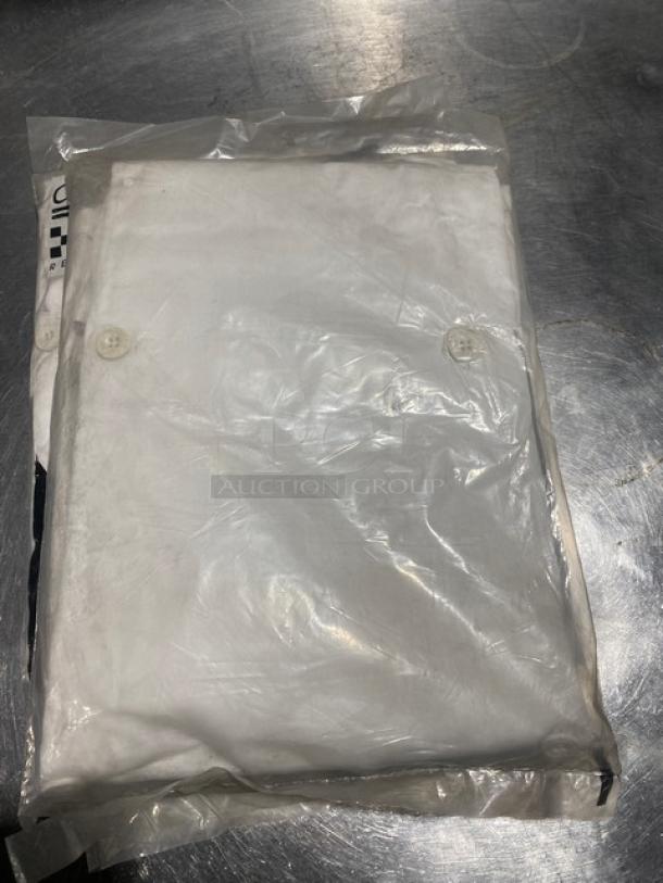 New Chef Revival LJ027-5X ladies' chef jacket, white polyester/cotton blend, 5X size, in packaging, buttons visible.